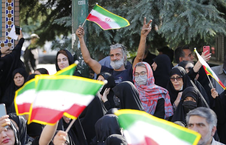 مسيرة موالية للحكومة في طهران ، إيران ، أكتوبر 2022.
