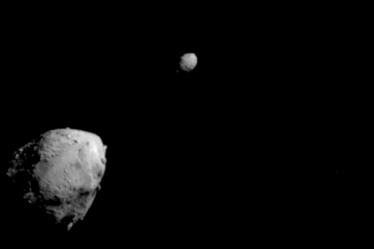 Two gray rocks in space.
