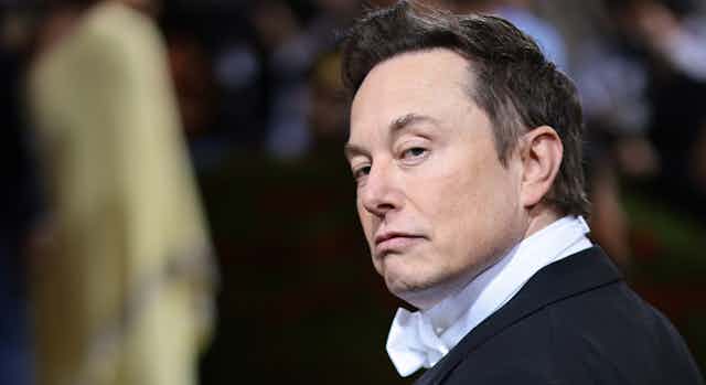 Elon Musk in black tie