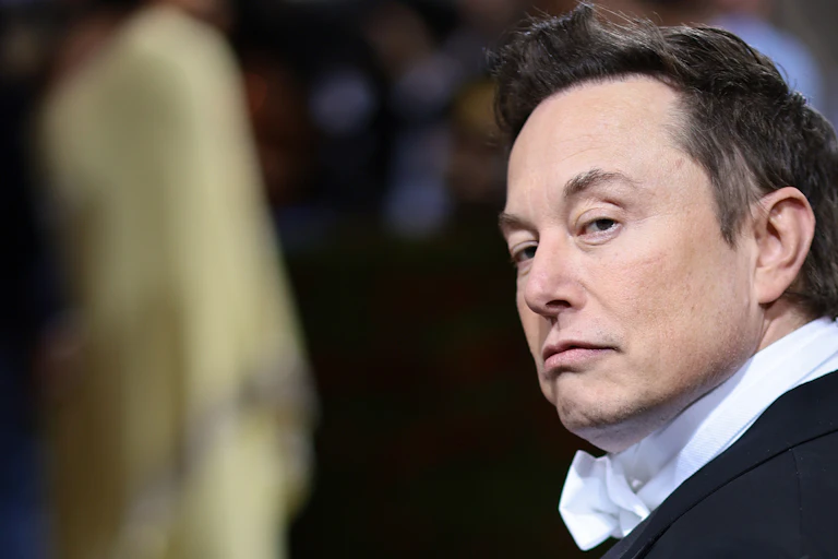 Elon Musk in black tie