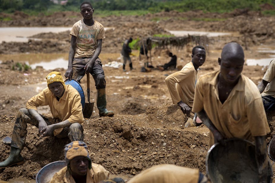 A group of Galamseyer, illegal gold panners, work in Kibi area, southern Ghana.