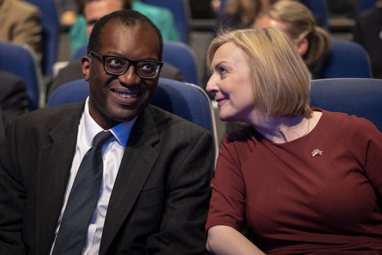 Kwasi Kwarteng and Liz Truss chatting at Conservative conference.