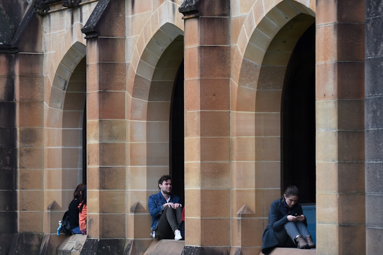 Students in the quadrangle of Sydney University.