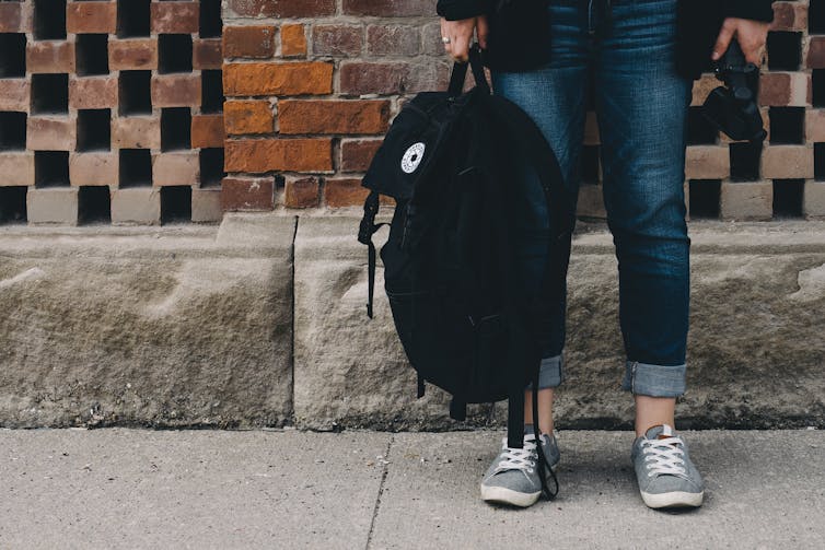 Student with backpack.