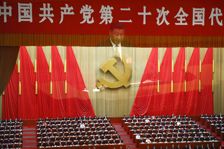 A multiple exposure photo shows Chinese President Xi Jinping during the opening ceremony of the 20th National Congress of the Communist Party of China at the Great Hall of People in Beijing, China, 16 October 2022.
