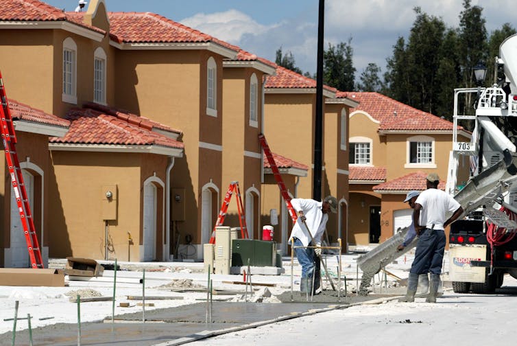 New houses and sidewalks under construction