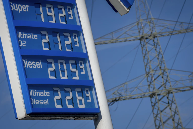 Gas prices on display on a gas station sign