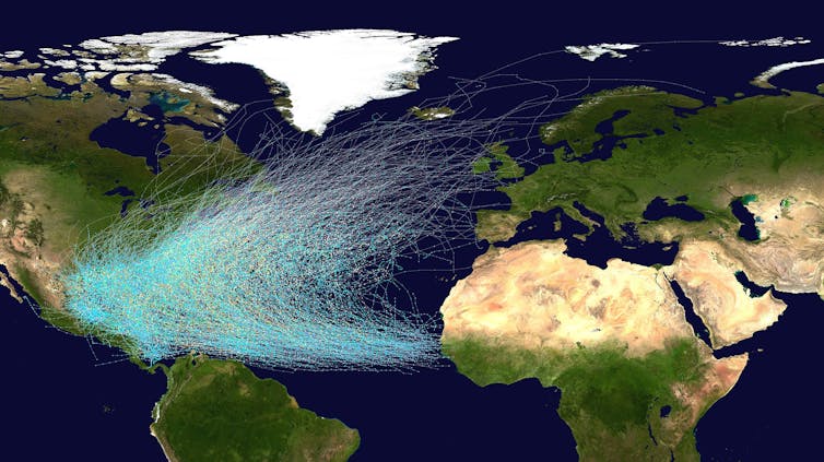 Satellite view of Atlantic showing tracks of each storm, most starting off Africa, heading west and then curving northward.