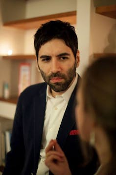 A man wearing a suit.