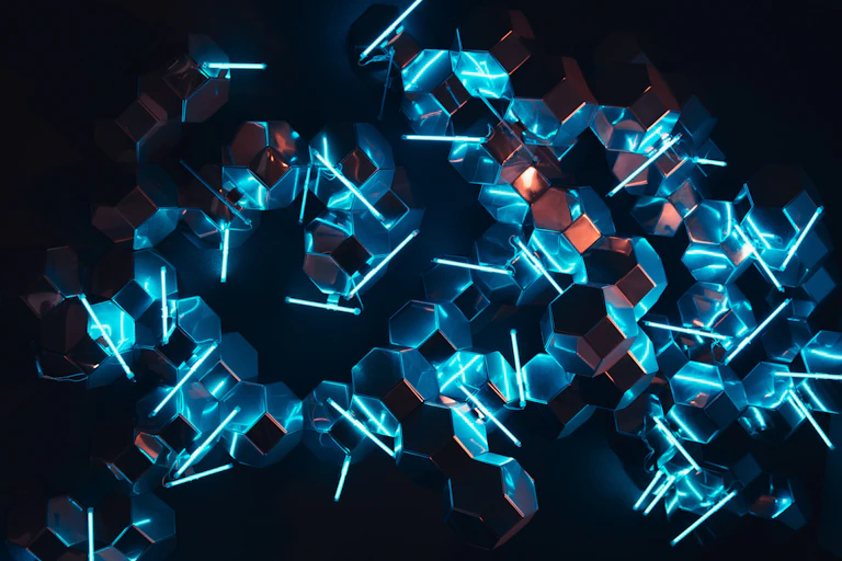 blue neon lights reflected in mirror cubes
