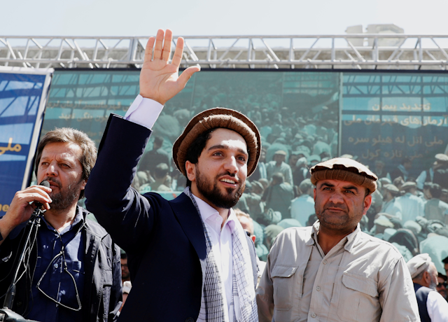 NRF leader Ahmda Massoud waves to supporters at a rally.