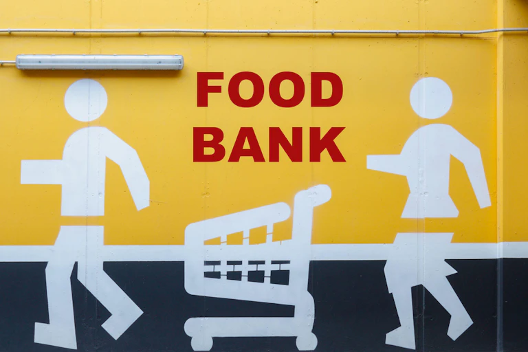 Sign showing the way to a food bank