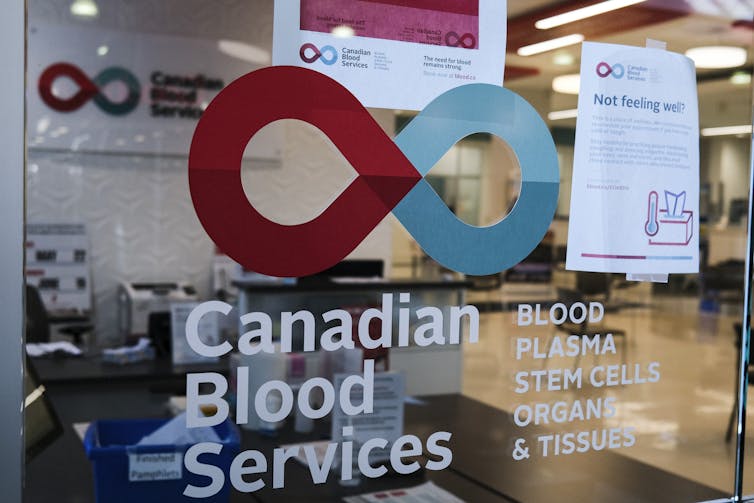 A window with the logo of Canadian Blood Services