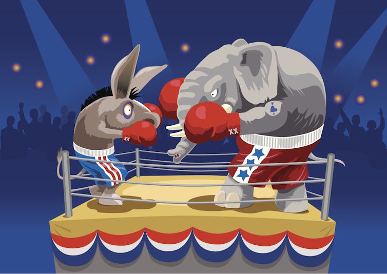 A donkey and an elephant are seen in a boxing ring that is covered with Election Day bunting.