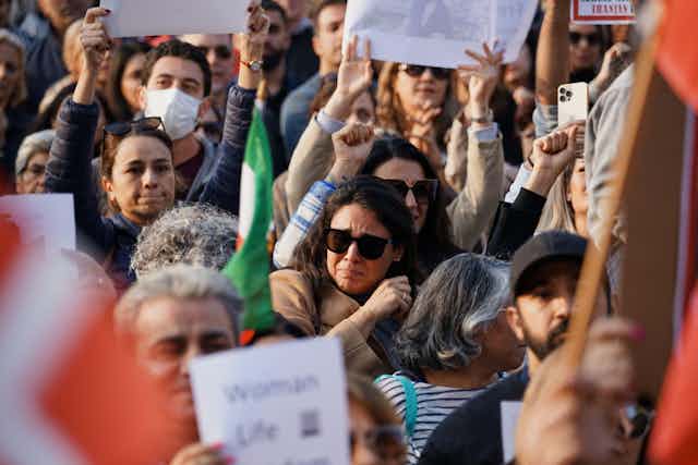 Women with banners and placards.