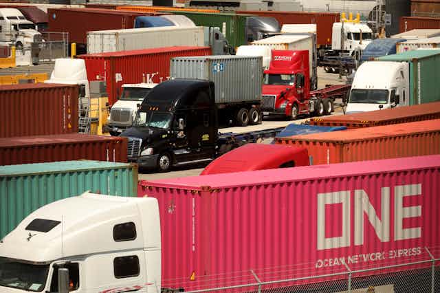 Trucks line up to unload at the Port of Los Angeles