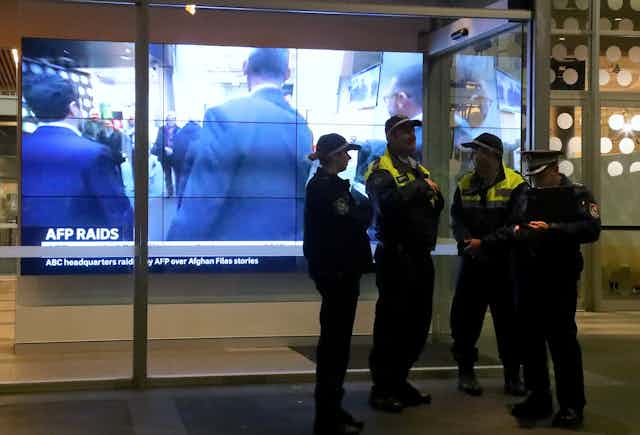 Police raid the ABC offices.