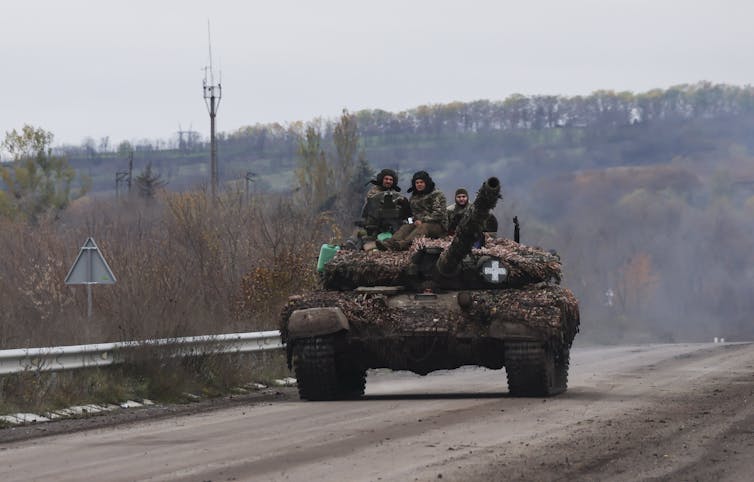 Ukrainian servicemen operating a tank in the Donetsk region