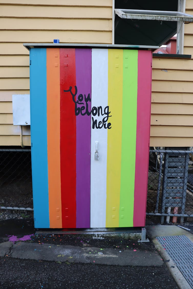 Colourful school cupboard with message, 'you belong here'.