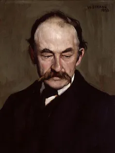 Portrait of man with moustache.