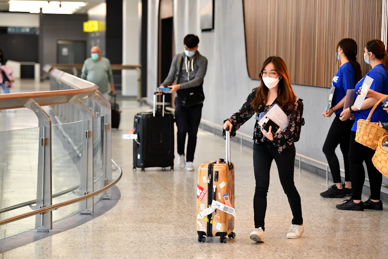 Passengers arriving at Melbourne airport from Singapore in November 2021.