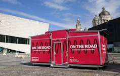 Red exhibition container in city square