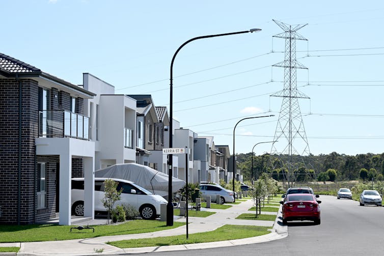 large new homes with electricity tower