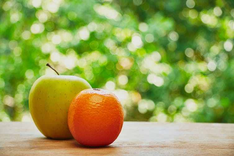 An apple and an orange.