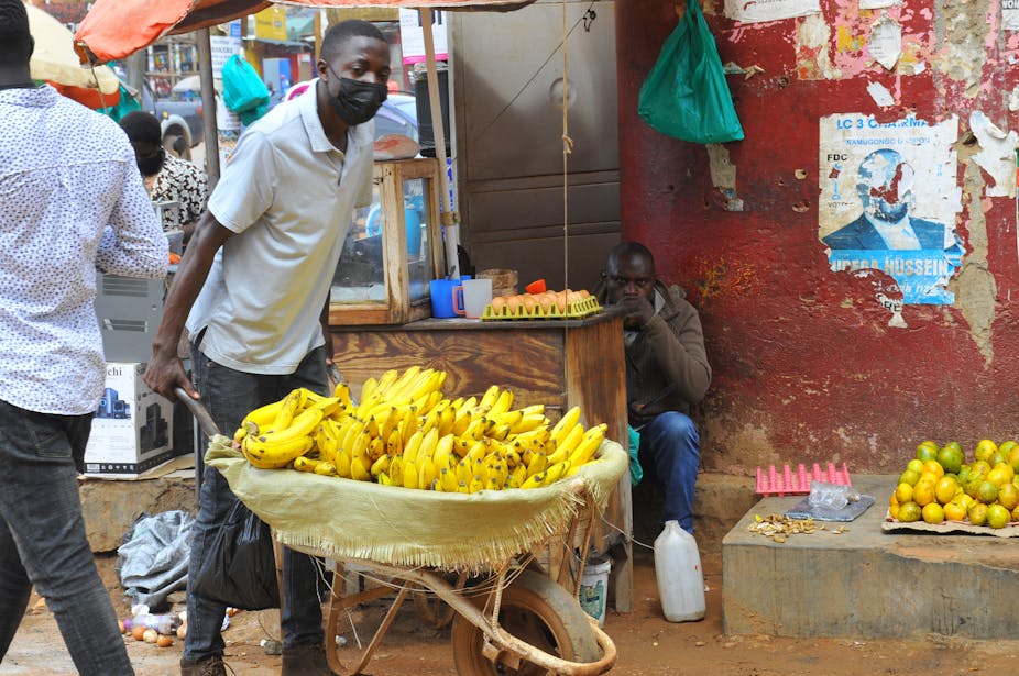 Informal trader selling fruits in Kampala