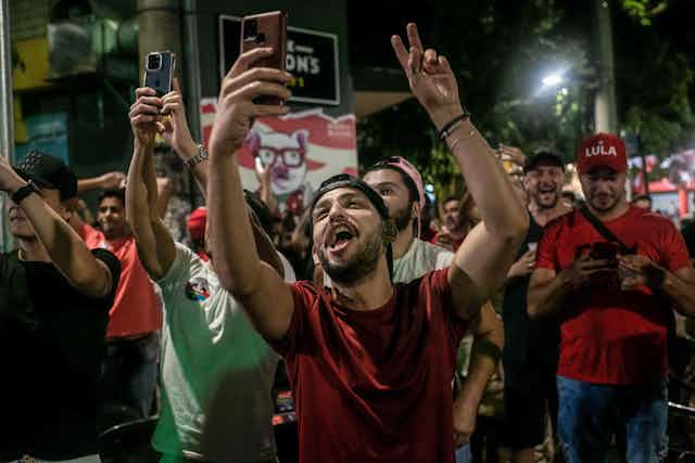 Supporters wearing red and green in the streets of Brazil.