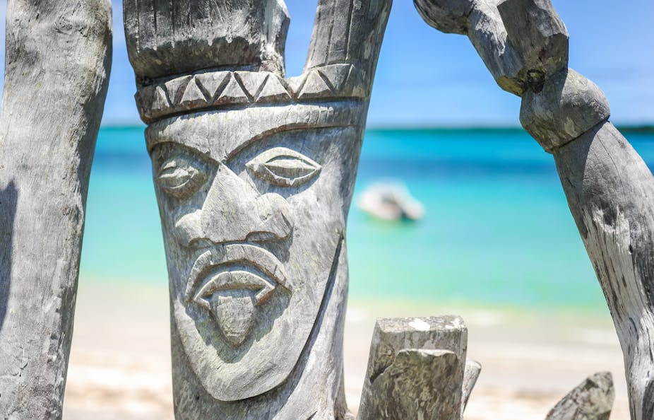 Wooden carving on beach