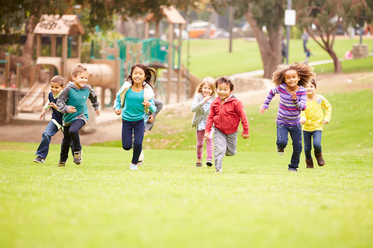 Kids running away from playground