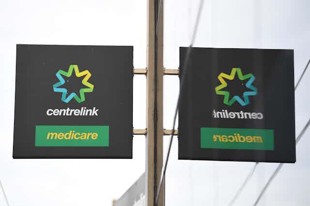 Signs saying 'Centrelink' and 'Medicare'