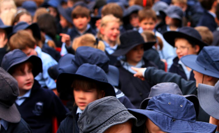 A crowd of primary schools students.