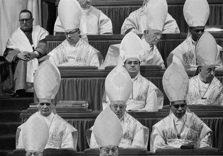 Cardinals seated in St. Peter's Basilica as they attend the opening ceremony of the second session of Vatican II on Sept. 29, 1963.