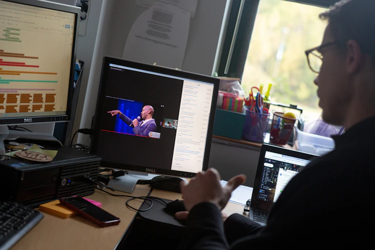 A person in front of a computer.