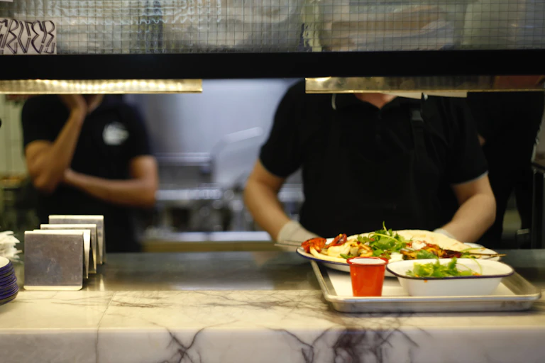 Serving counter with a food tray