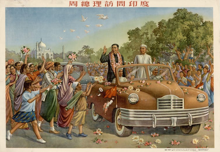 A hand-drawn colour poster of two men standing up in an open-top car waving to crowds of Indian people.