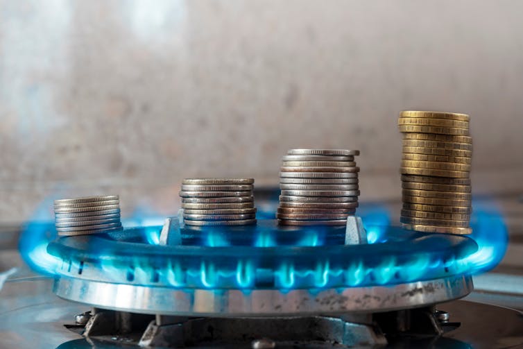 coins on gas stove
