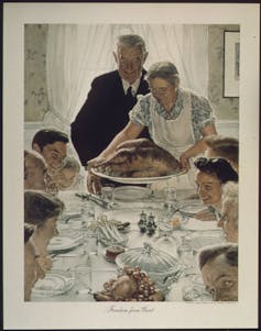 A painting depicting an old-fashioned, traditional Thanksgiving family feast
