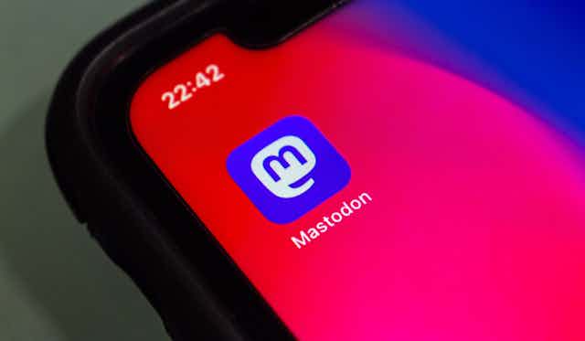 Mastodon app logo on a smartphone screen