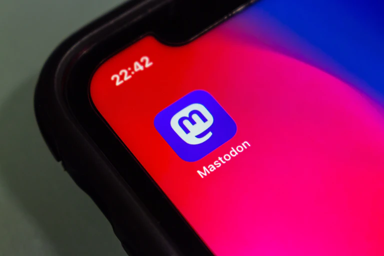Mastodon app logo on a smartphone screen