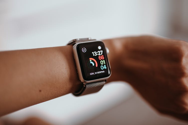 A photo of a smartwatch on a woman's wrist.