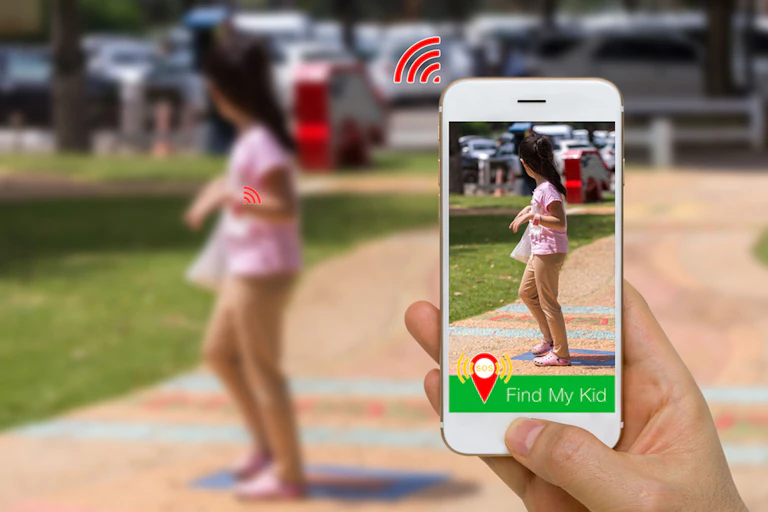A child with a digital tracking device