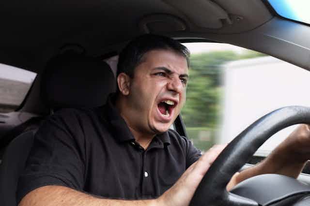 Angry male driver shouting