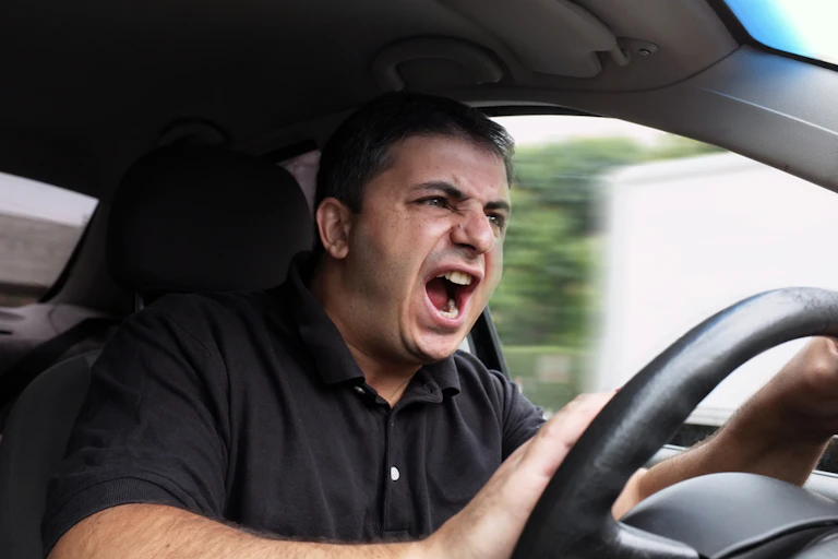 Angry male driver shouting