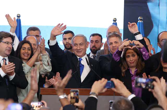 Former Israeli prime minister and leader of the Likud party Benjamin Netanyahu (C) thanks his supporters after speaking at the Likud party final election event in Jerusalem, Israel, 01 November 2022.