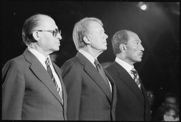 Israeli prime minister Menahem Begin,  US president Jimmy Carter and Egyptian president Anwar Sadat at Camp David in 1978