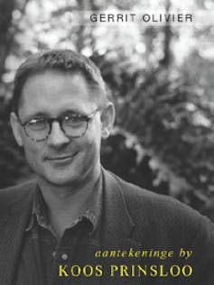 A book cover featuring a black and white portrait of a man with short hair and round glasses, smiling wryly against a backdrop of natural vegetation.