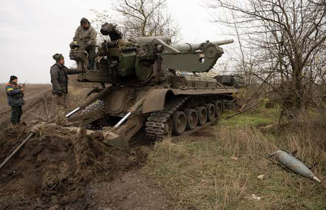 Ukrainian servicemen operate with the self-propelled 203mm cannon 'Pion' on their position in Kherson area, Ukraine, 09 November 2022